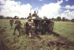 An IPKF mechanised infantry section dismounts from a BMP-1 ICV. - http://www.bharat-rakshak.com/LAND-FORCES/Army/Images-1987.html